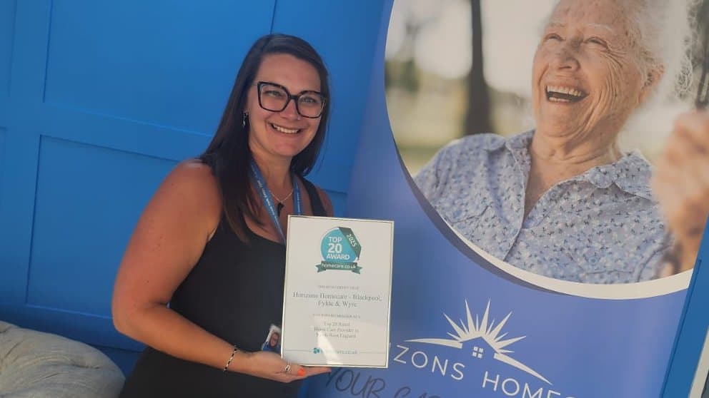 Lisa Garrad, Registered Manager, Blackpool, holding the homecare.co.uk Top 20 2025 certificate for Horizons Homecare Blackpool, Fylde & Wyre